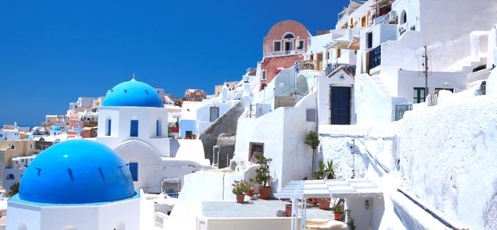 Houses with blue roofs on the Santorini island, Greece