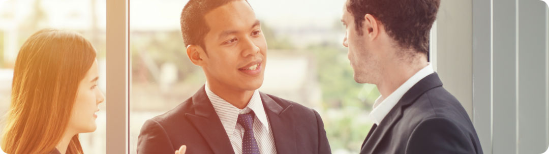 Professional translators in a business meeting at a translation agency